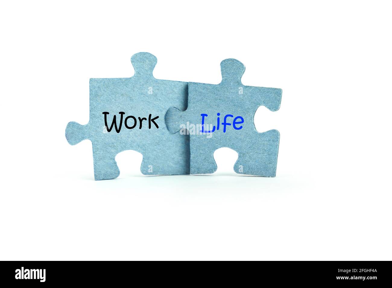 Work and life. Two blue puzzles on white background. Balance and choice ...