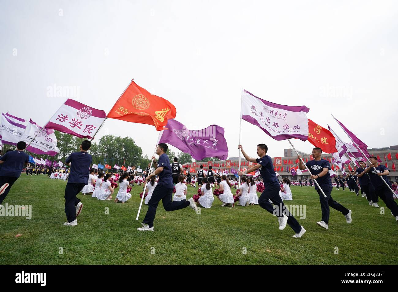 Beijing, China. 25th Apr, 2021. Students perform at the opening ceremony of a sports event in Tsinghua University in Beijing, capital of China, April 25, 2021. Tsinghua University commemorated its 110th anniversary on Sunday. Credit: Ju Huanzong/Xinhua/Alamy Live News Stock Photo