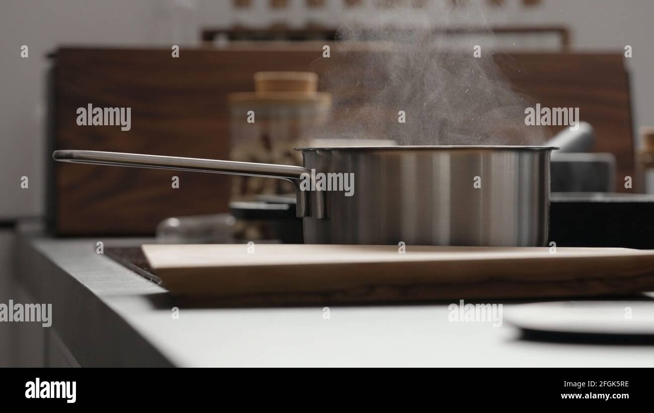 Steam rising from boiling pot hi-res stock photography and images - Alamy