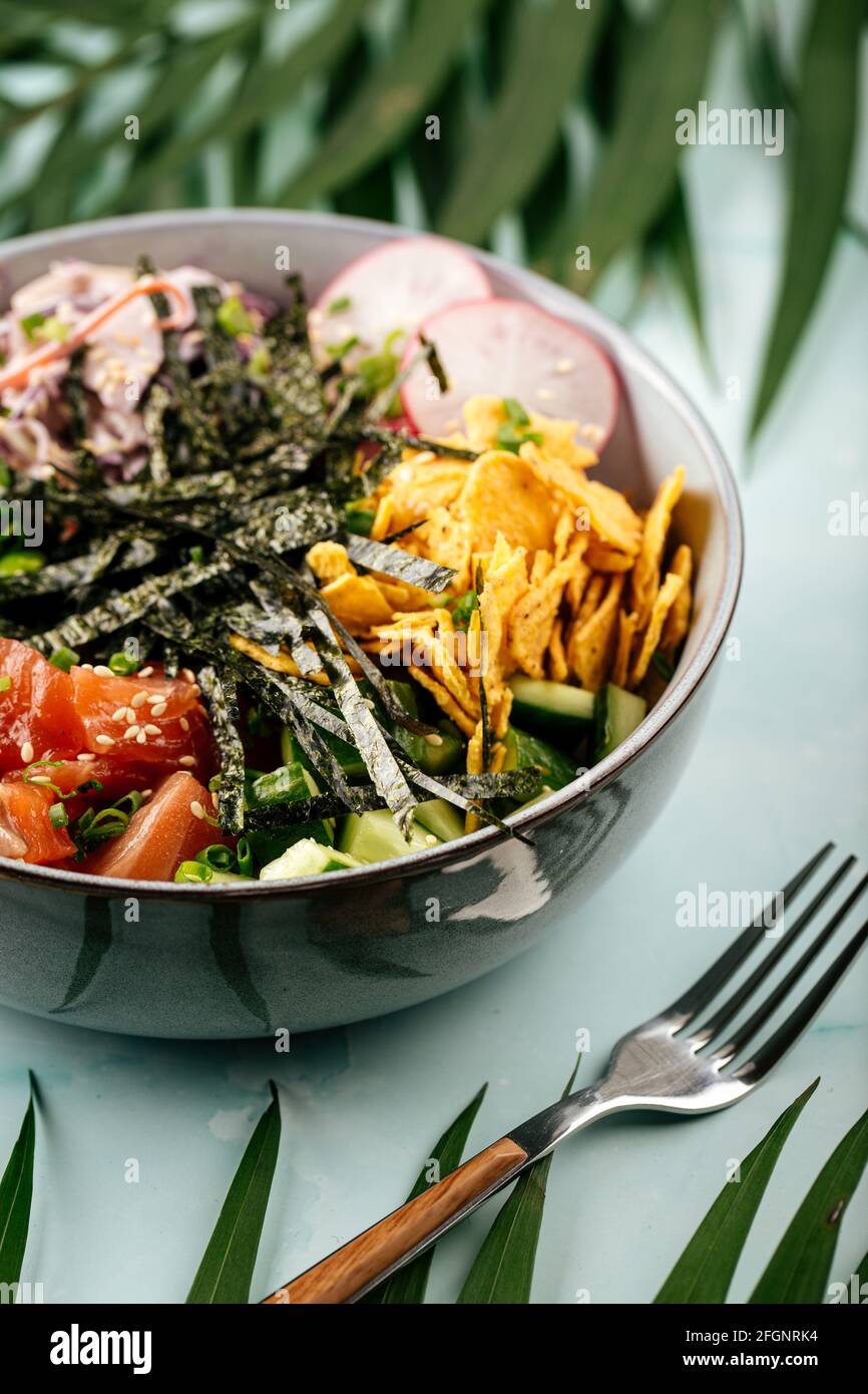 Hawaiian salmon poke bowl with rice and vegetables Stock Photo Alamy