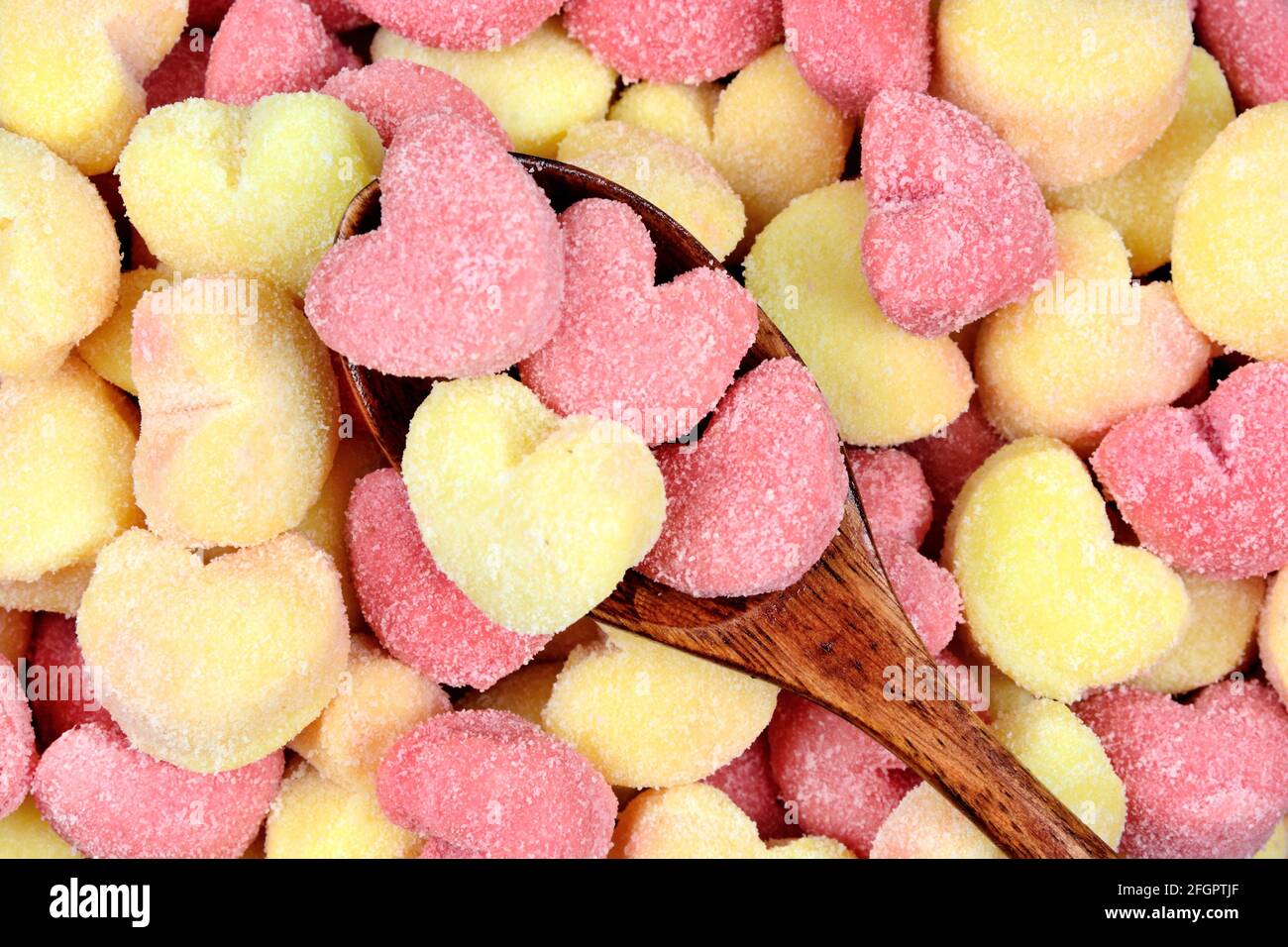 Close up of wooden spoon on a many gnocchi hearts Stock Photo