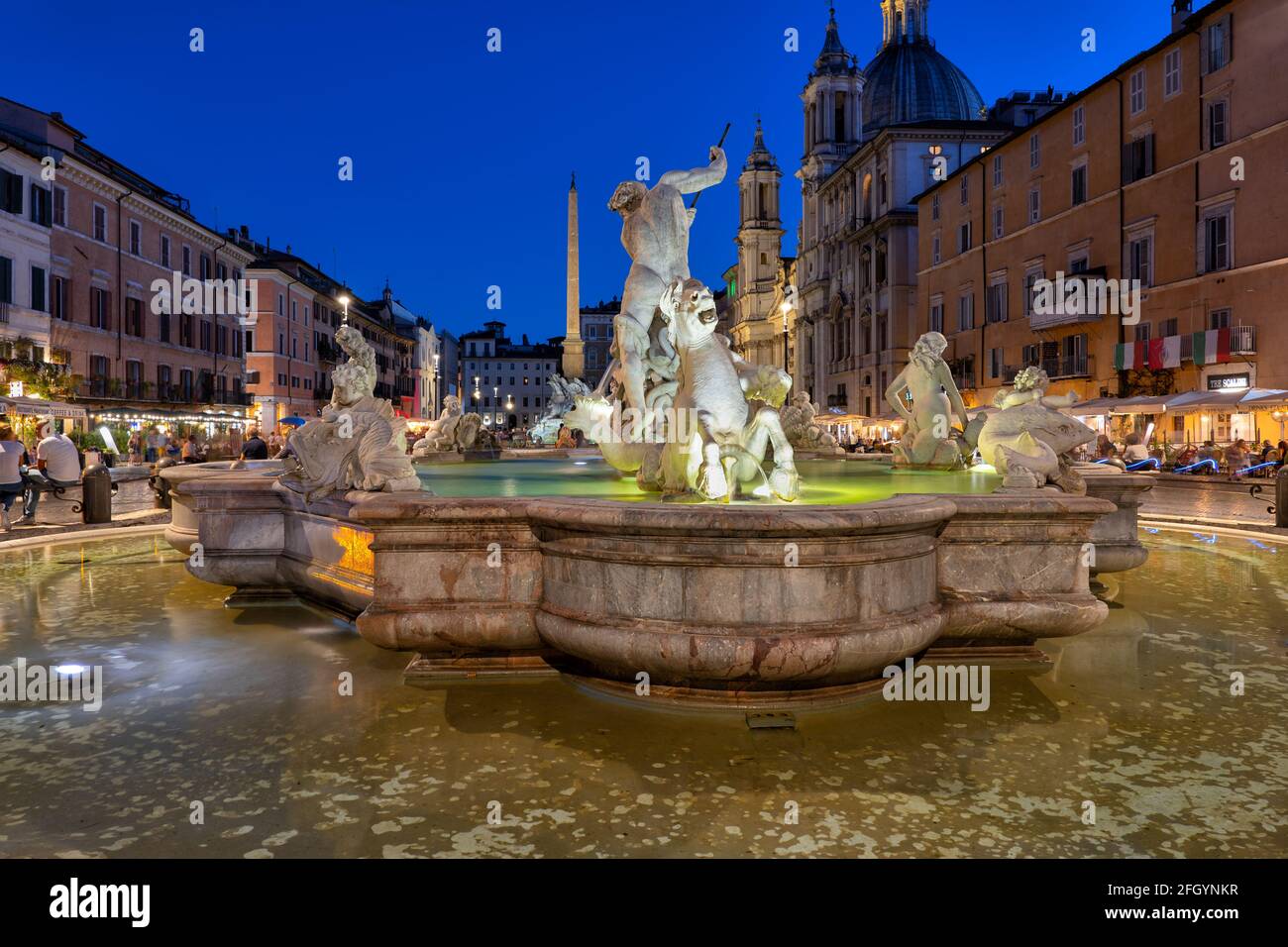 Fountain of Neptune (1574) on Piazza Navona at night, city square in ...