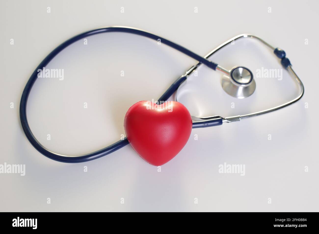 Stethoscope Heart on white background Stock Photo - Alamy