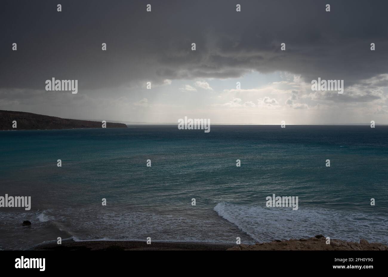 Stormy sky with dramatic clouds and sea. Stormy weather at the ocean ...
