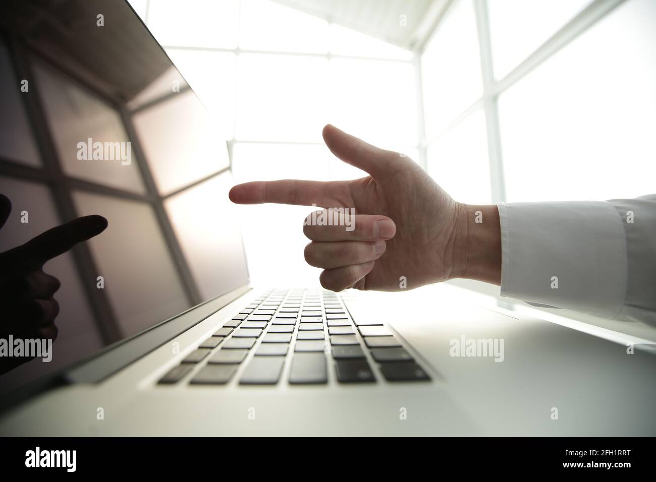 Point Finger Computer Man points finger laptop hi-res stock photography and images - Alamy