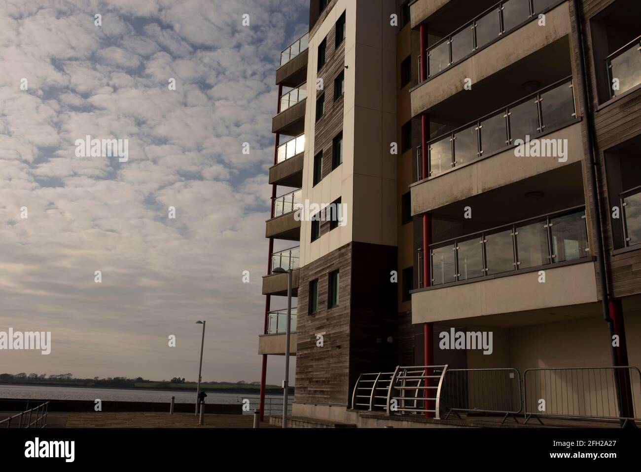 Apartment blocks at Victoria Dock in Caernarfon, Wales. With sea in the