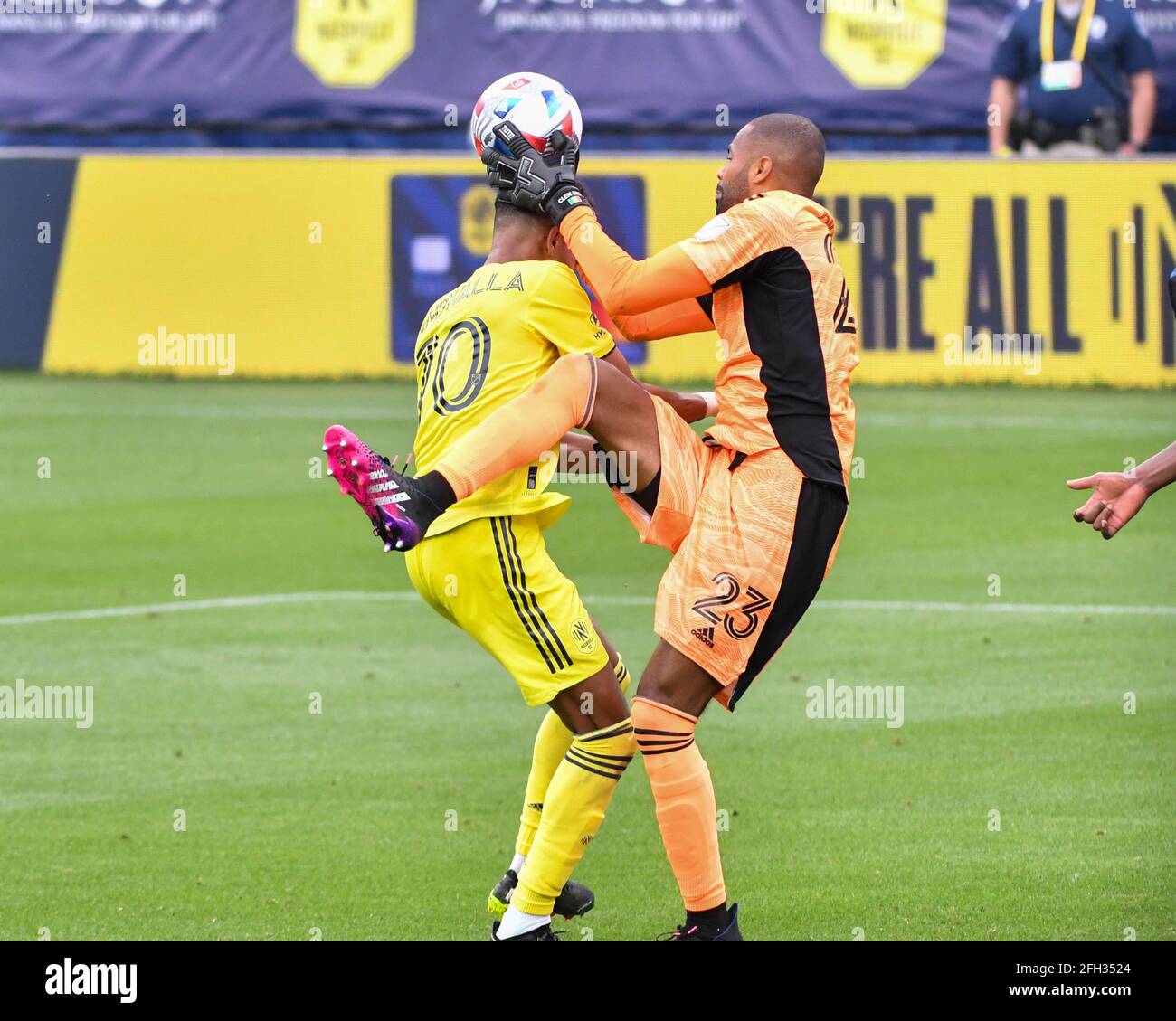 Nashville, TN, USA. 24th Apr, 2021. Montreal goalkeeper, Clement Diop (23), makes a save in front of the goal during the MLS match between CF Montreal and Nashville SC at Nissan Stadium in Nashville, TN. Kevin Langley/CSM/Alamy Live News Stock Photo