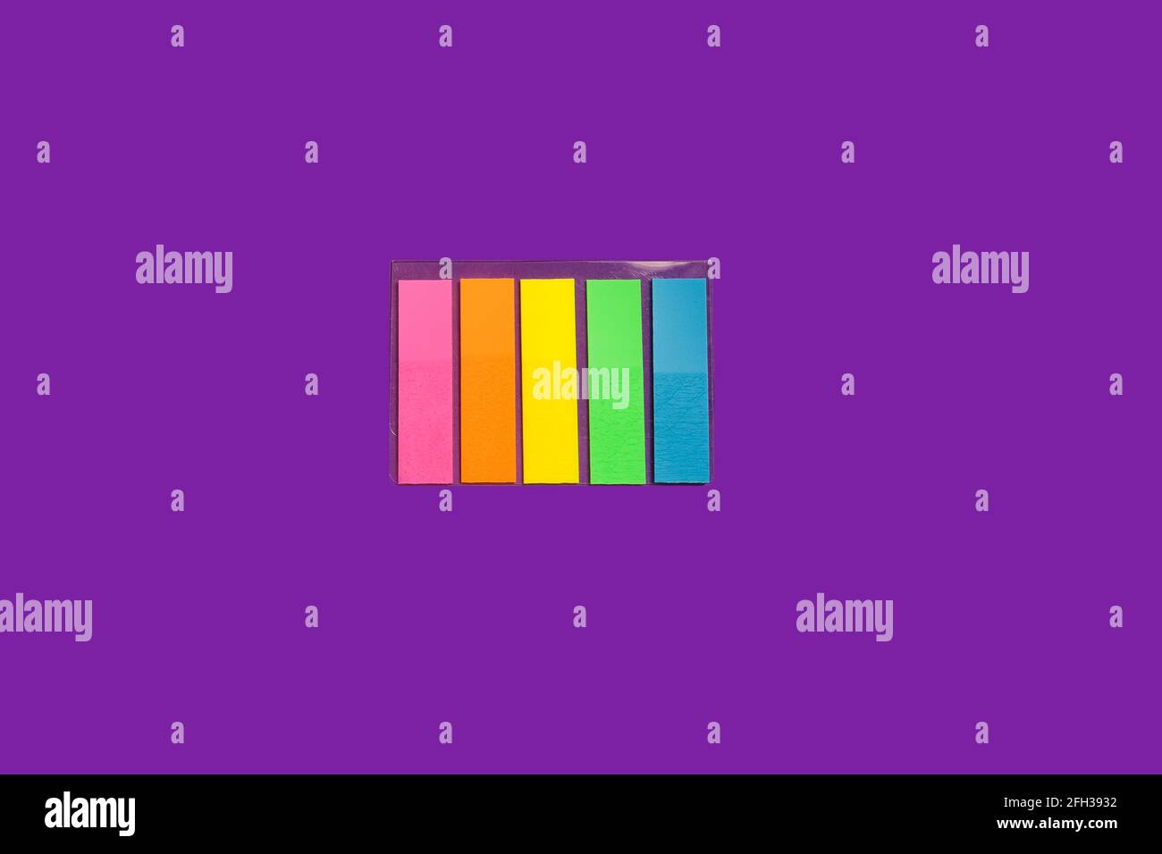 set of sticky notes on a purple background Stock Photo
