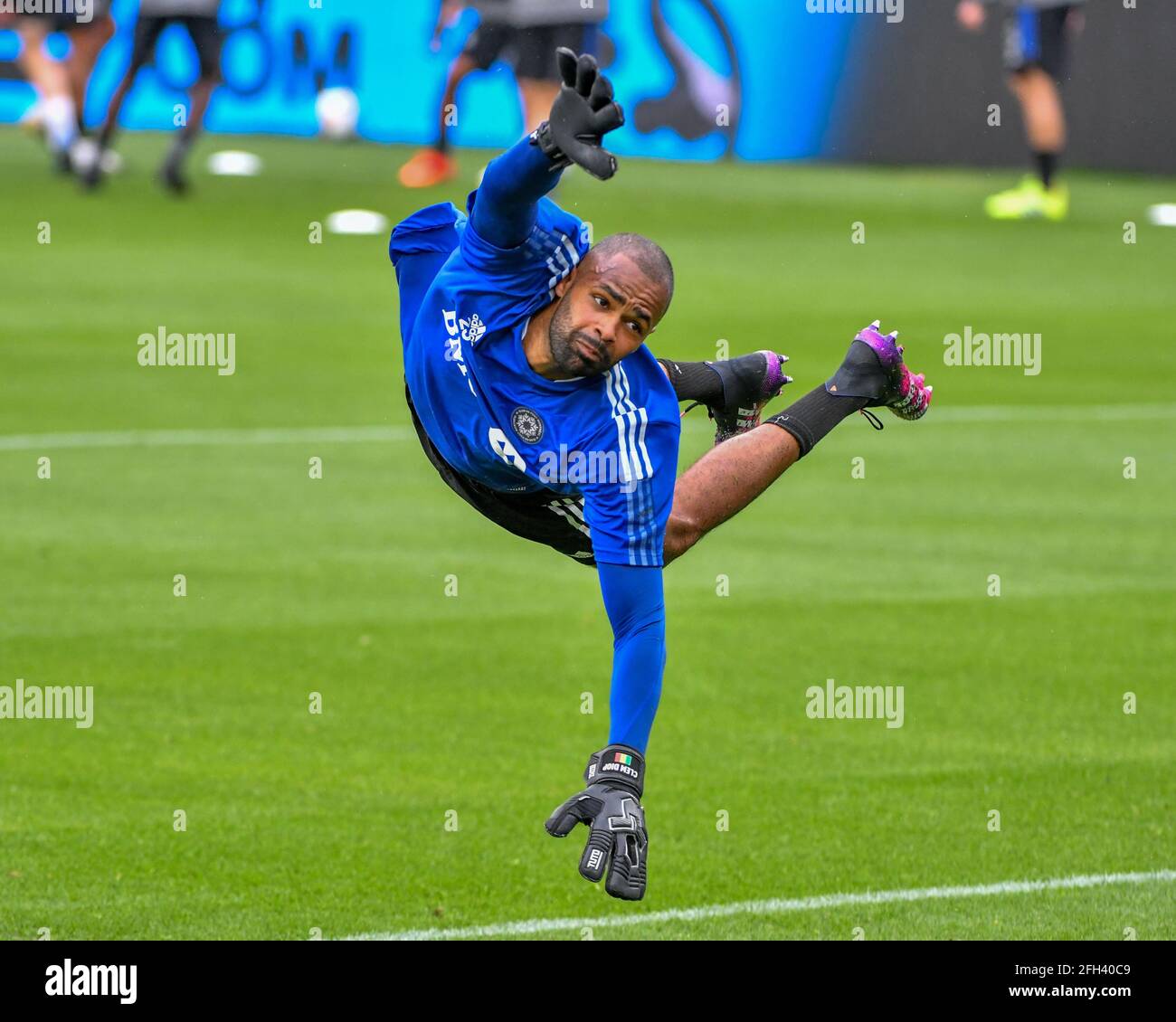 Nashville, TN, USA. 24th Apr, 2021. Montreal goalkeeper, Clement Diop (23), makes a diving save during warm up before the MLS match between CF Montreal and Nashville SC at Nissan Stadium in Nashville, TN. Kevin Langley/CSM/Alamy Live News Stock Photo