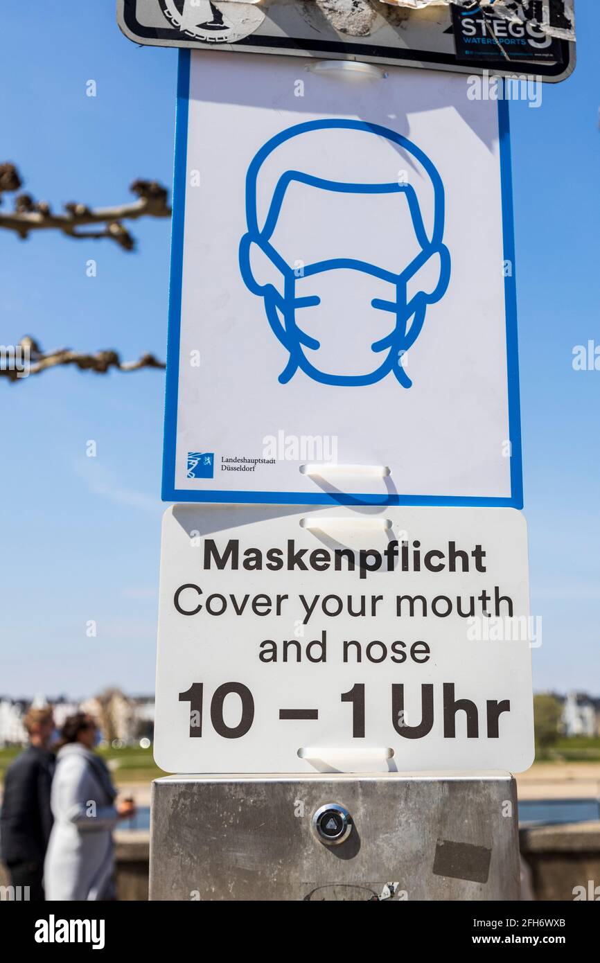 Mandatory use of protective masks during the corona / covid-19 pandemic in Düsseldorf, Germany Stock Photo