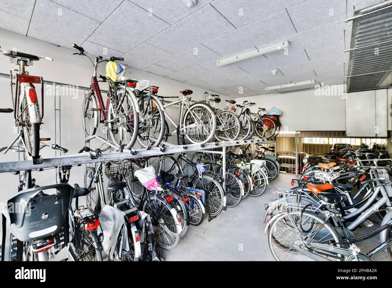 Bicycle storage room in apartment building Stock Photo