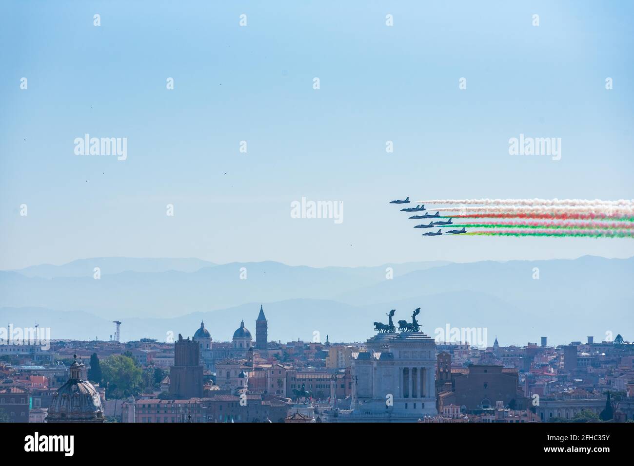 The Italian tricolor arrows (Frecce Tricolori) fly over Rome on the ...
