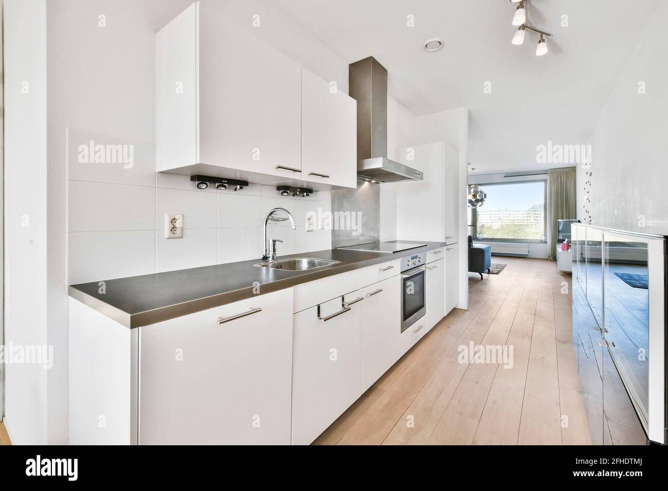 Kitchen with contemporary furniture and appliances Stock Photo - Alamy