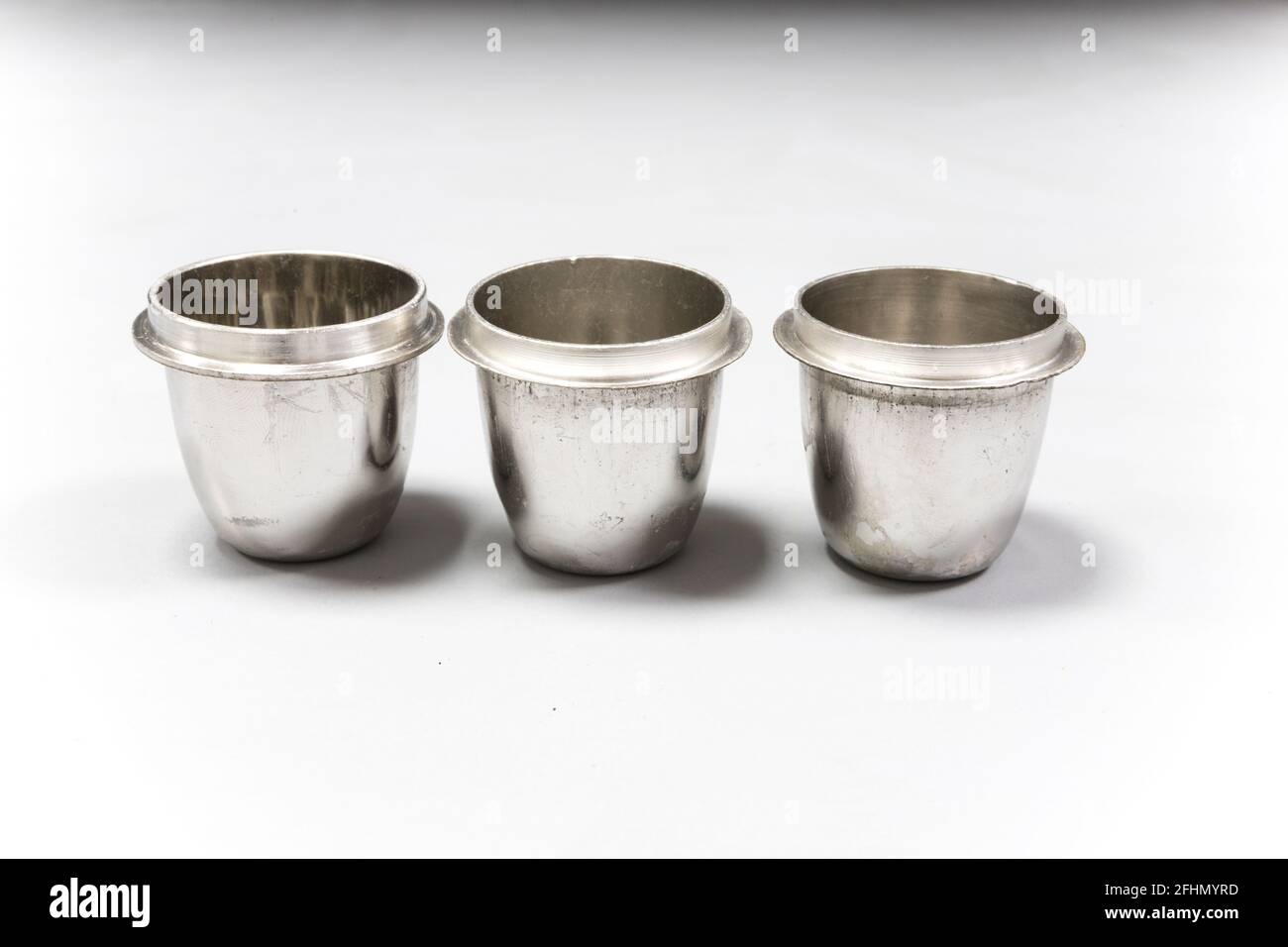 Platinum crucibles used for sample preparation in an analytical chemistry laboratory. Shiny metal lab equipment Stock Photo
