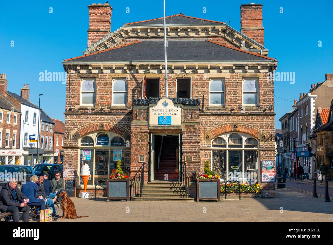 Town Council Offices High Street Northallerton North Yorkshire decorated with flowers on a sunny spring day windows and doors open  mitigate Covid 19 Stock Photo
