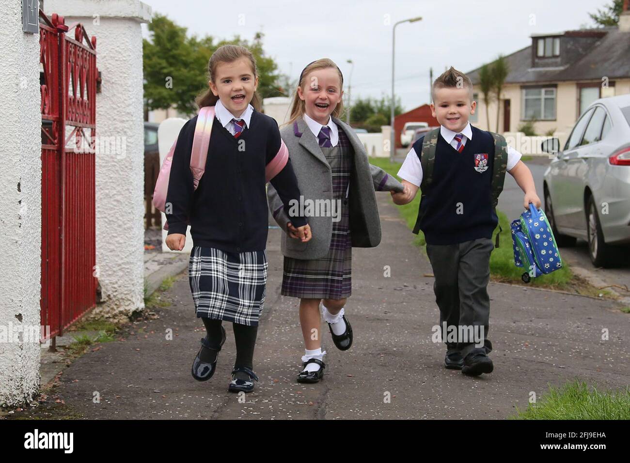 Ayrshire, Scotland, 20 Aug 2018. First day of Primary School .Three  children in thier new school uniform Stock Photo - Alamy