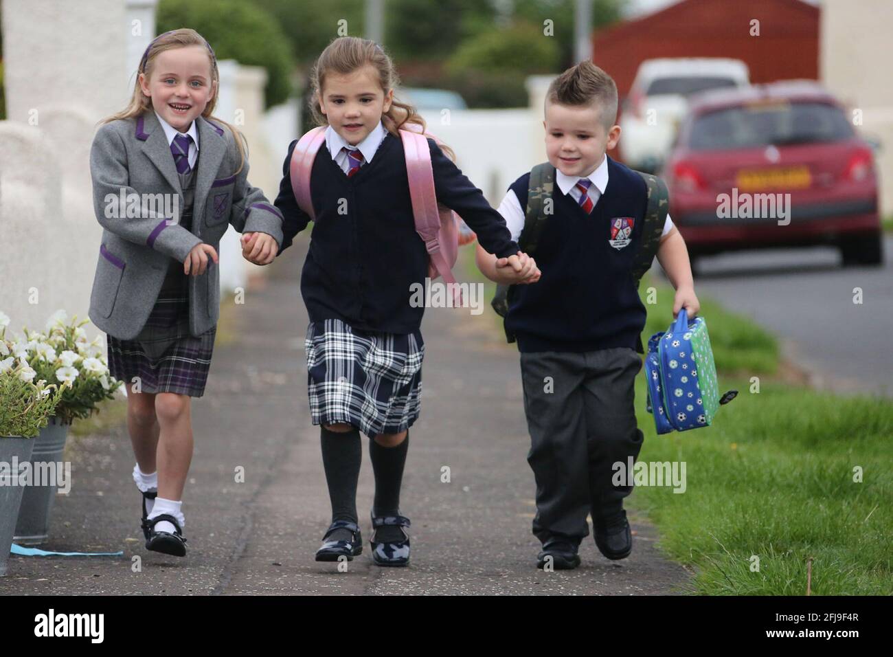 Ayrshire, Scotland, 20 Aug 2018. First day of Primary School .Three