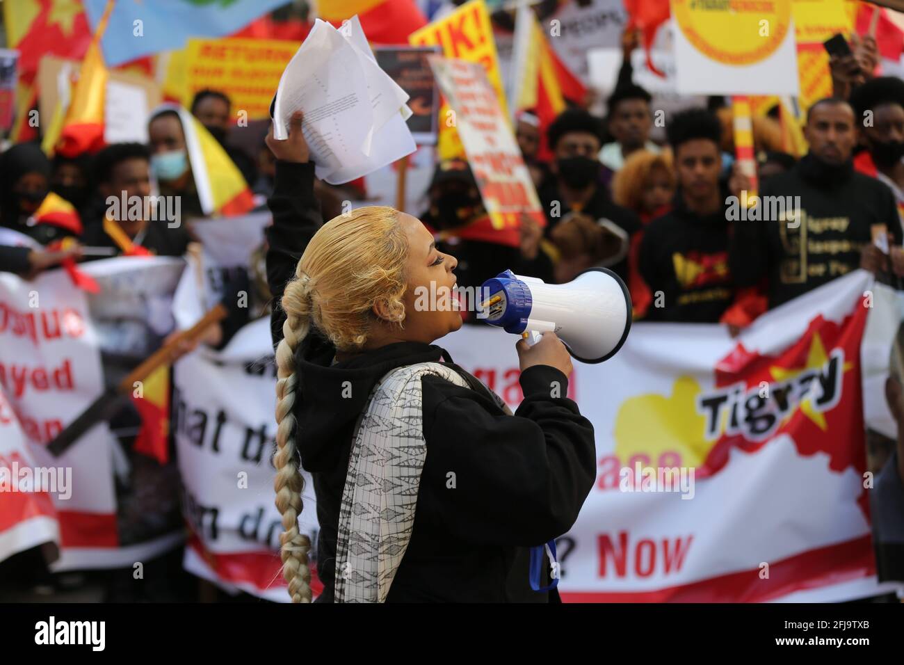 London, England, UK. 25th Apr, 2021. Hundreds marched through central London to protest war in Ethiopia's Tigray region. The war-torn northern region has been the location of a conflict between pro-government and local fighters. Clashes resulted in thousands of refugees and reportedly mass killings. Ethiopian Prime Minister Abiy Ahmed recently that Eritrean troops has been fighting in Tigray. The protesters are calling for the UK government and international community to take action against the Ethiopian government. Credit: Tayfun Salci/ZUMA Wire/Alamy Live News Stock Photo