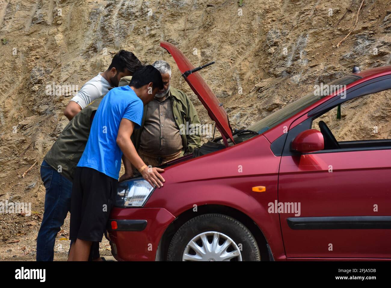 Preventive maintenance and inspection of car engine by professionals ...