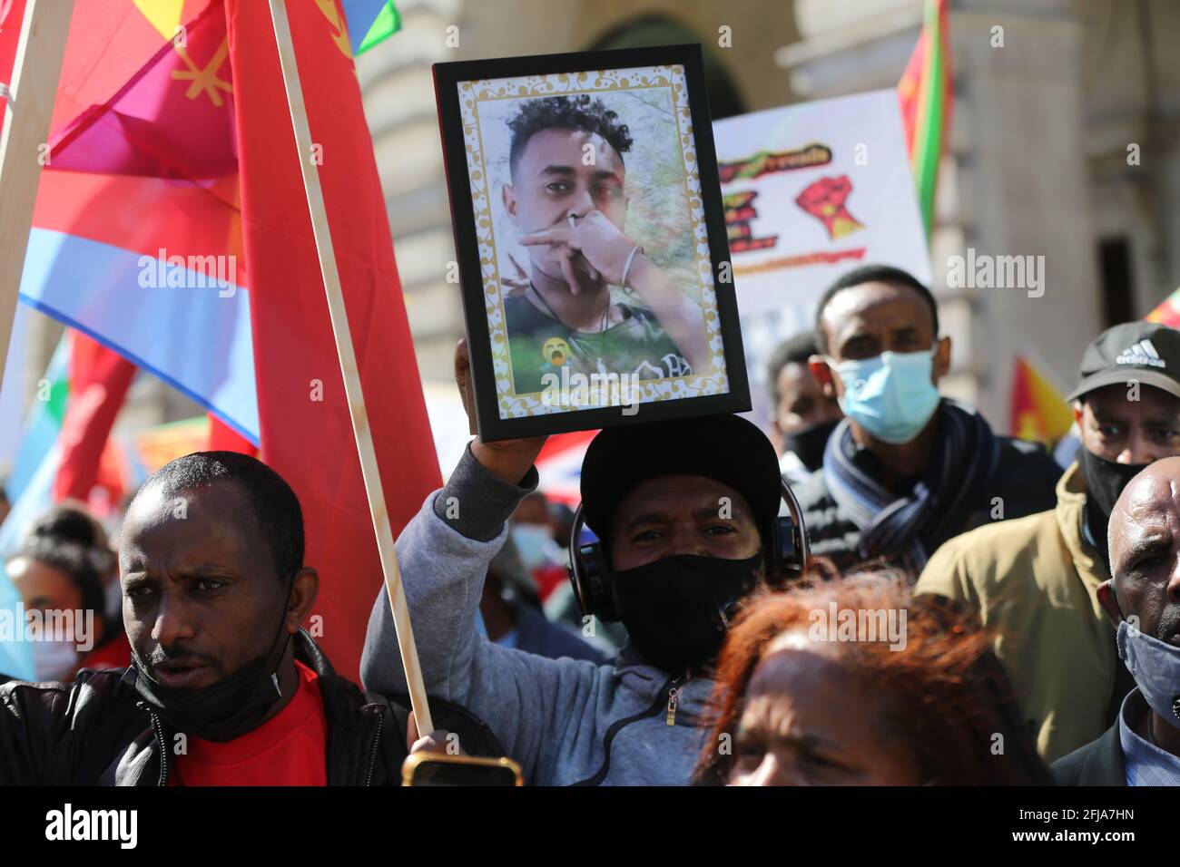 London, England, UK. 25th Apr, 2021. Hundreds marched through central London to protest war in Ethiopia's Tigray region. The war-torn northern region has been the location of a conflict between pro-government and local fighters. Clashes resulted in thousands of refugees and reportedly mass killings. Ethiopian Prime Minister Abiy Ahmed recently that Eritrean troops has been fighting in Tigray. The protesters are calling for the UK government and international community to take action against the Ethiopian government. Credit: Tayfun Salci/ZUMA Wire/Alamy Live News Stock Photo