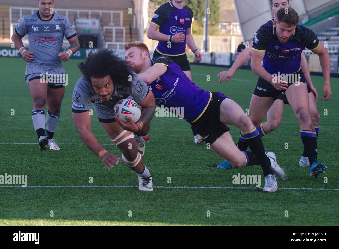 Newcastle upon Tyne, England, 25 April 2021. Joel Farrell diving to score a try for Sheffield Eagles against Newcastle Thunder in the Betfred Championship match at Kingston Park. Credit: Colin Edwards/Alamy Live News. Stock Photo