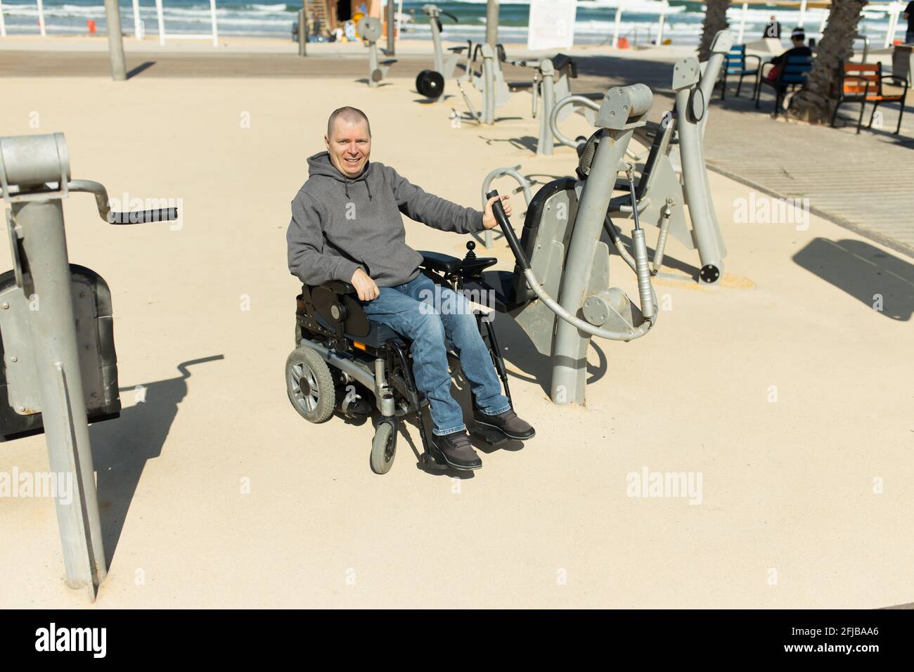 Disabled man in wheelchair working out sport Stock Photo