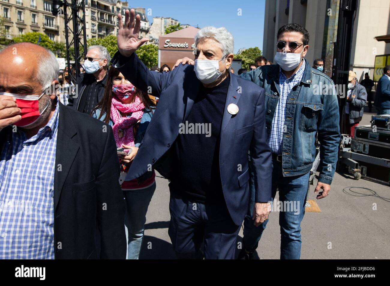 French singer Gaston Ghrenassia aka Enrico Macias (C) arrives as people gather to ask justice for late Sarah Halimi on Trocadero plaza in Paris on April 25, 2021. Halimi, a 65-year-old Orthodox Jewish woman, died in 2017 after being pushed out of the window of her Paris flat by neighbour Traore, 27, who shouted "Allahu Akbar" ("God is great" in Arabic). Traore, a heavy cannabis smoker, has been in psychiatric care since Halimi's death and he remains there after the ruling. Photo by Raphael Lafargue/ABACAPRESS.COM Stock Photo