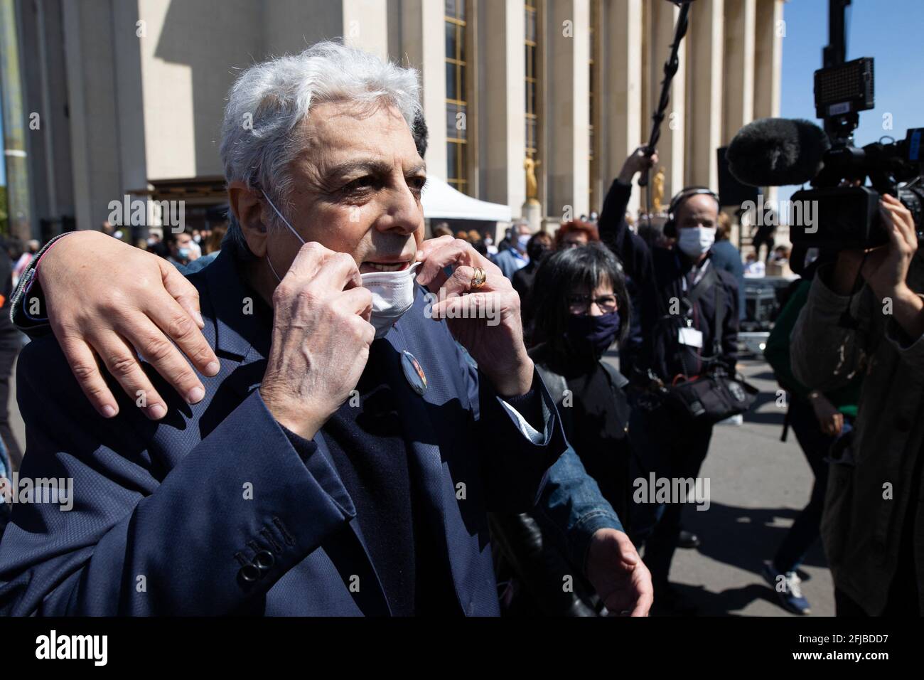 French singer Gaston Ghrenassia aka Enrico Macias (C) arrives as people gather to ask justice for late Sarah Halimi on Trocadero plaza in Paris on April 25, 2021. Halimi, a 65-year-old Orthodox Jewish woman, died in 2017 after being pushed out of the window of her Paris flat by neighbour Traore, 27, who shouted "Allahu Akbar" ("God is great" in Arabic). Traore, a heavy cannabis smoker, has been in psychiatric care since Halimi's death and he remains there after the ruling. Photo by Raphael Lafargue/ABACAPRESS.COM Stock Photo
