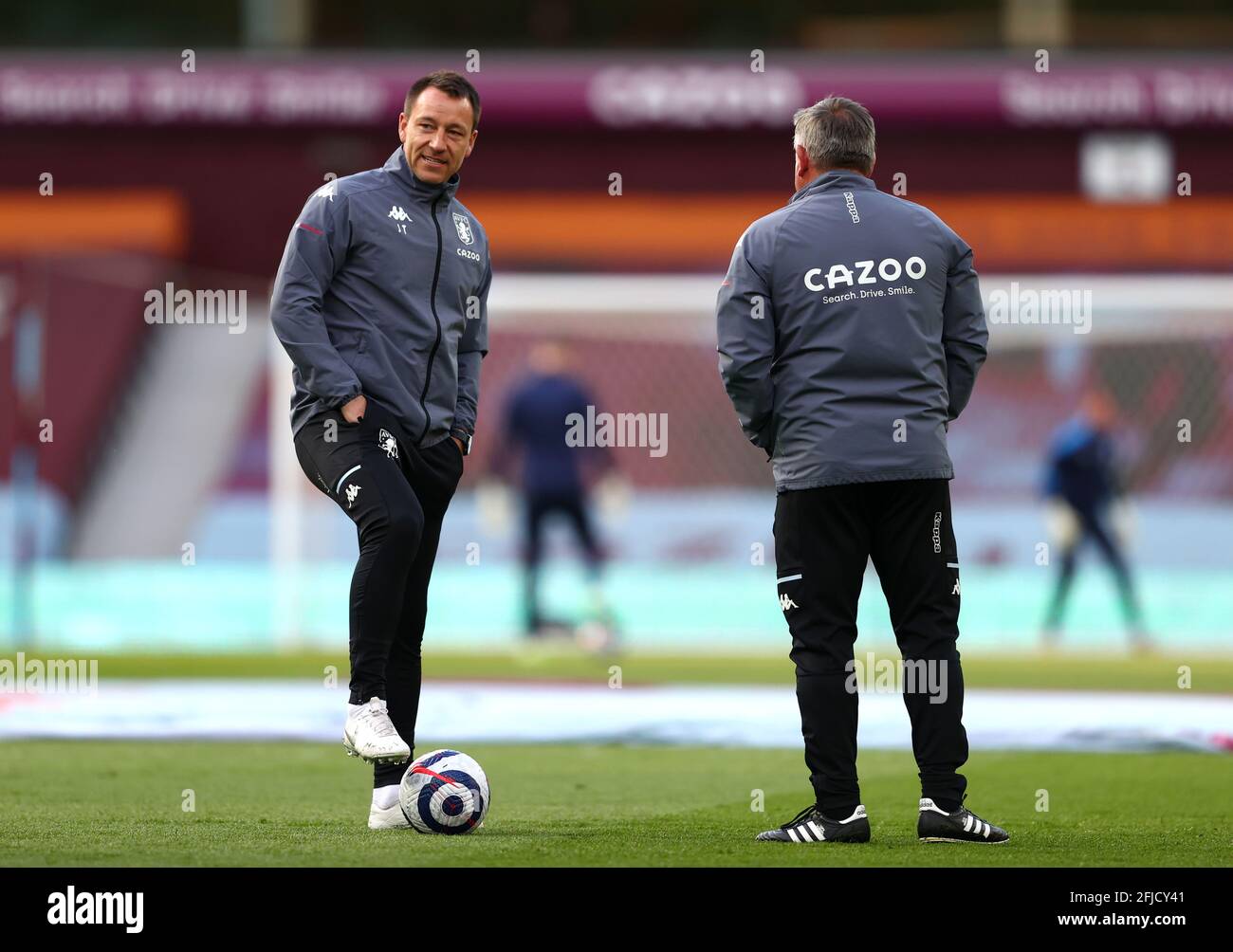 Aston Villa assistant coaches John Terry and Craig Shakespeare warming up before the Premier League match at Villa Park, Birmingham. Picture date: Sunday April 25, 2021. Stock Photo