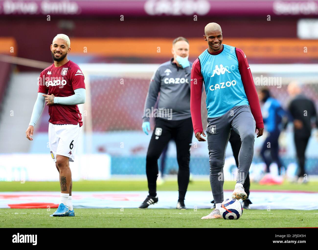 Aston Villa's Wesley (right) warming up before during the Premier League match at Villa Park, Birmingham. Picture date: Sunday April 25, 2021. Stock Photo