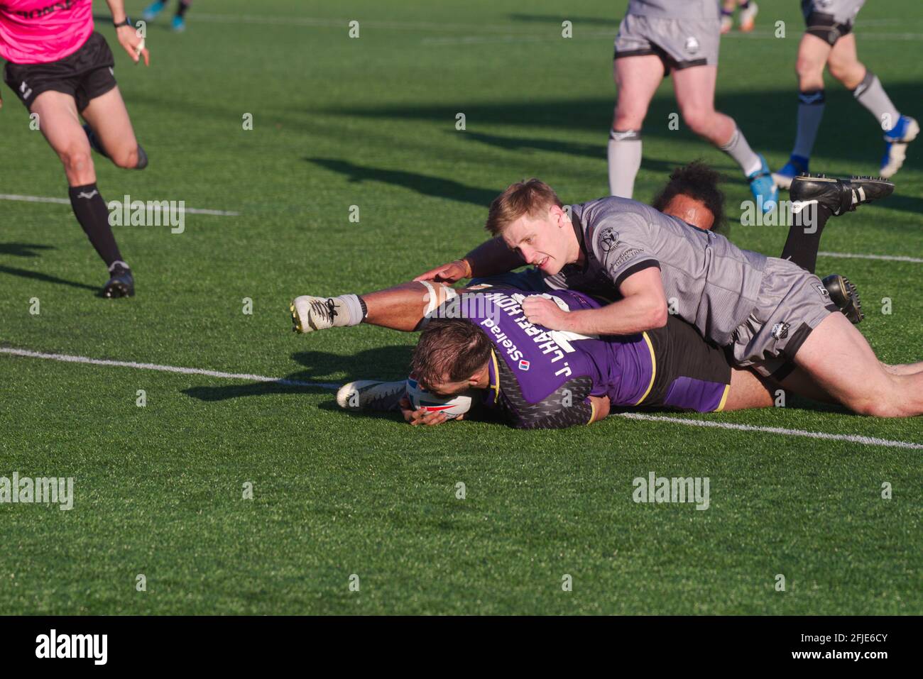 Newcastle upon Tyne, England, 25 April 2021. Ted Chapelhow diving to score a try for Newcastle Thunder against Sheffield Eagles in the Betfred Championship match at Kingston Park. Credit: Colin Edwards/Alamy Live News. Stock Photo