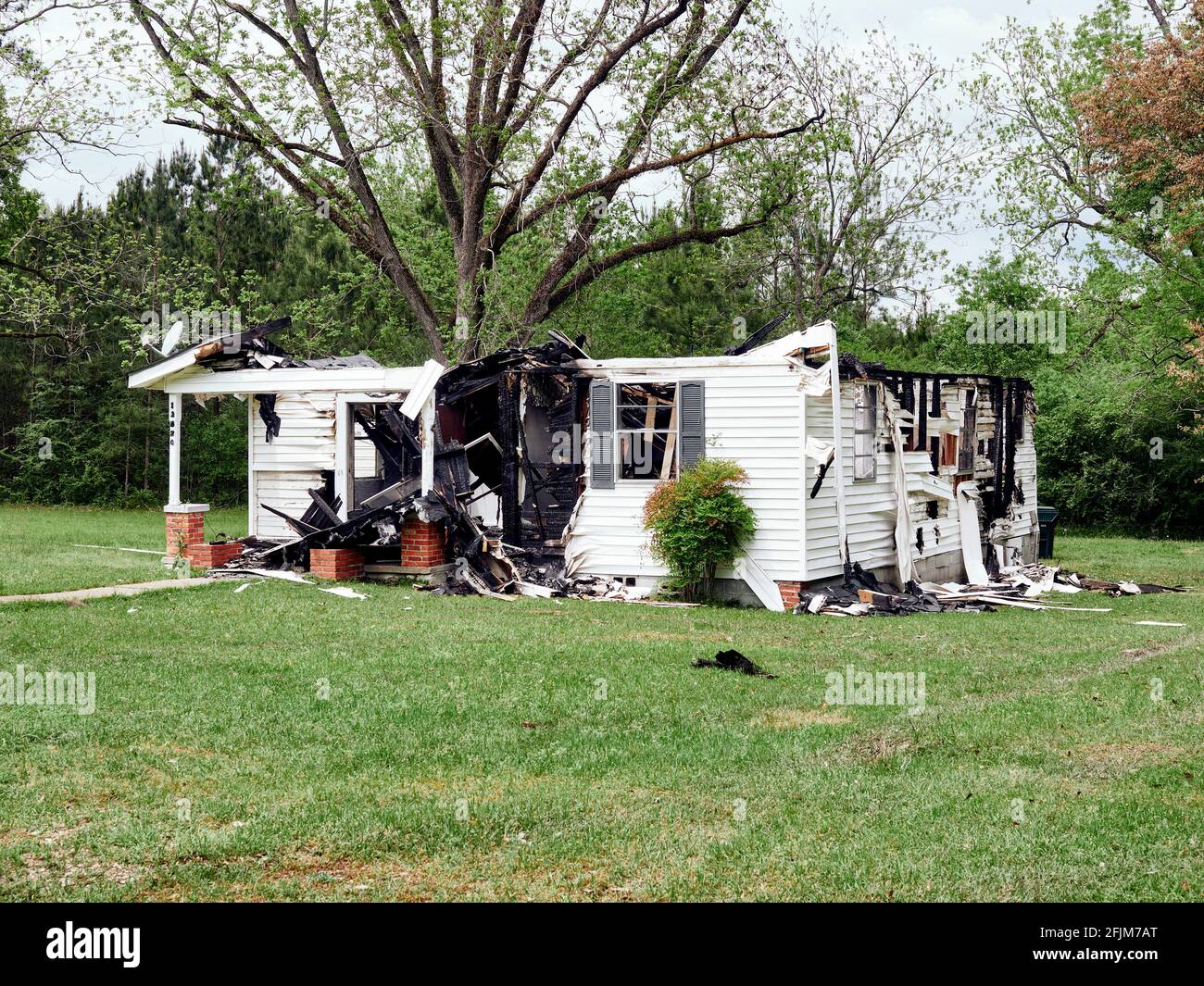 Burned out house the victim of a house fire with extensive damage in Montgomery Alabama, USA. Stock Photo