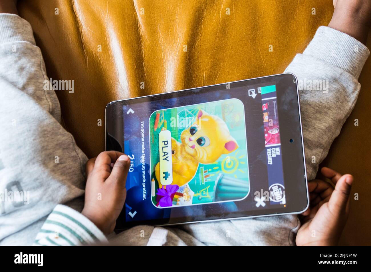 Child watching ipad hi-res stock photography and images - Alamy