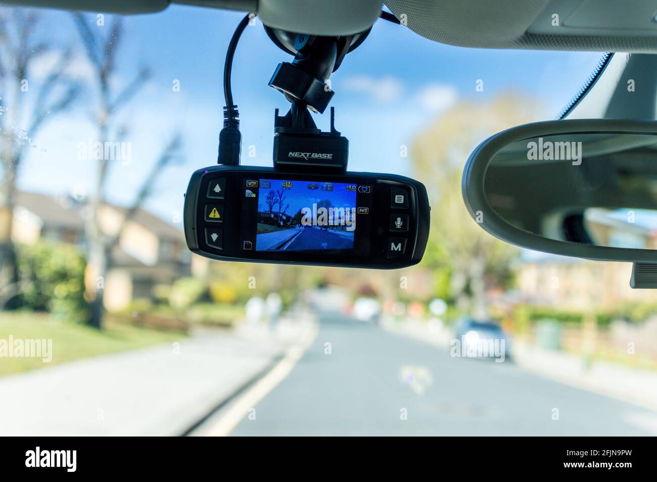 Dashcam recording in car placed at the front windshield Stock Photo Alamy