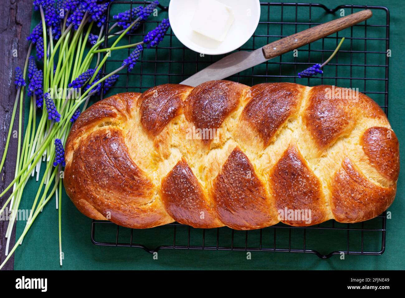 Challah made from yeast dough, a traditional festive dessert bread. Stock Photo