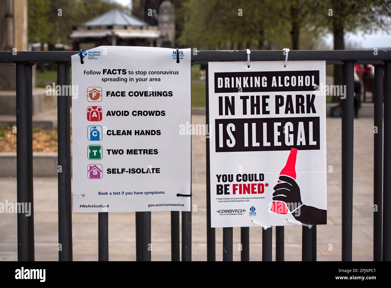 Because of antisocial behaviour the previous week signs have gone up reminding people that it is illegal to drink in Princes Street Gardens. Stock Photo