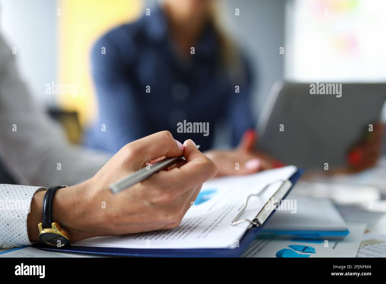 Woman office worker makes notes hi-res stock photography and images - Alamy