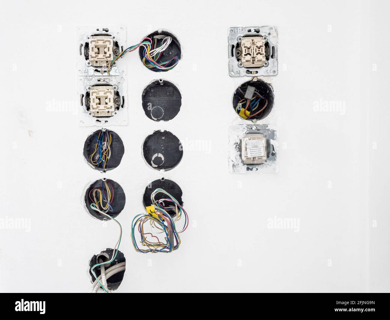 Refurbishment of a socket and light switch in the house Stock Photo Alamy