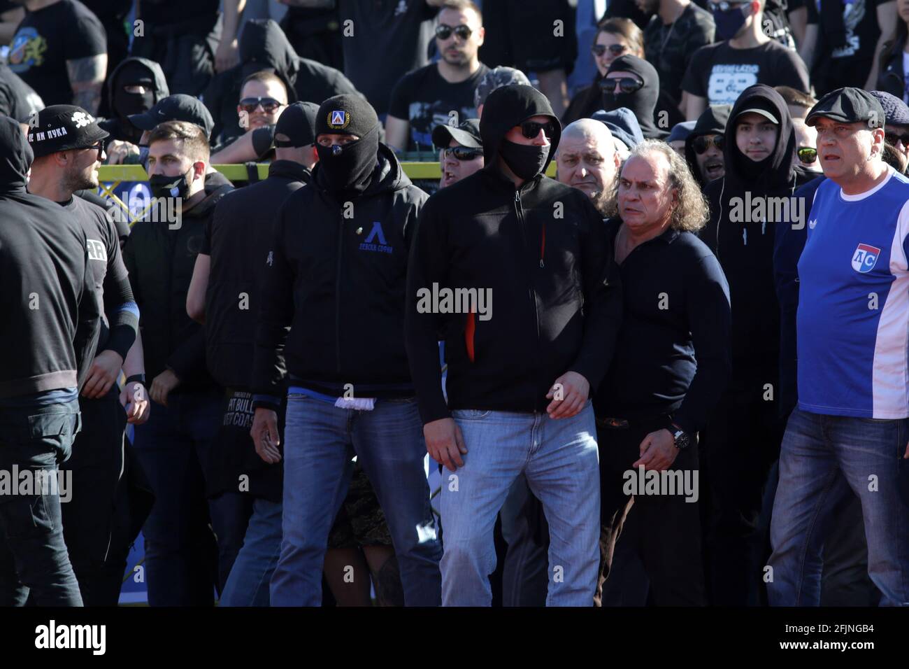 Sofia, Bulgaria: 25 April, 2021: Levski's supporters enter the stadium's track during the national championship football match between Levski and CSKA Sofia. Football fans have been allowed to attend the stadium with less than 30% of the seats amidst the coronavirus pandemic. Credit: Pluto/Alamy Live News Stock Photo