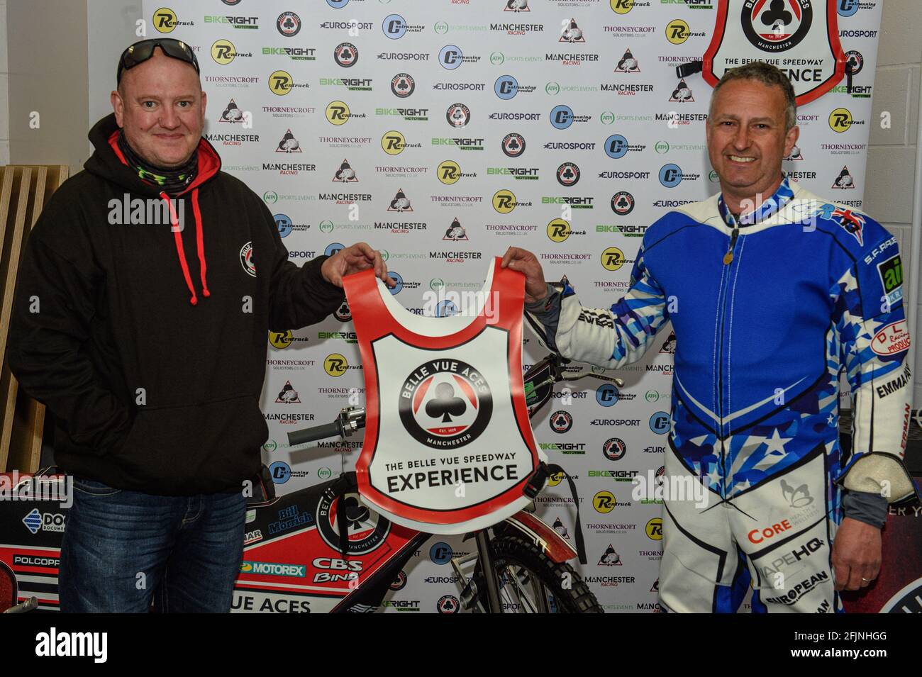 MANCHESTER, UK. APRIL 25TH Joe Screen (left) presents Glyn Edwards with his  Experience Body Colour during the Belle Vue Experience training day at the  National Speedway Stadium, Manchester on Sunday 25th April