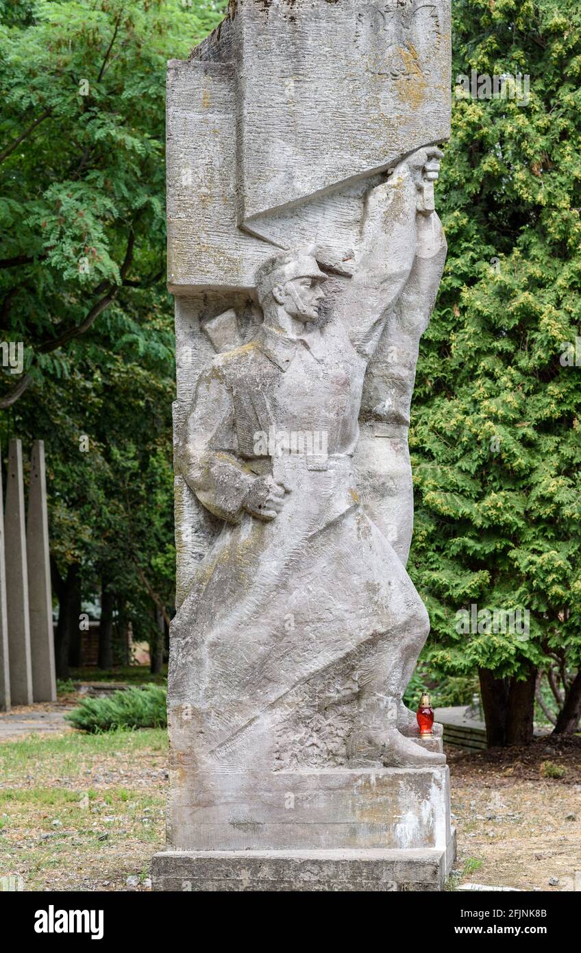 Poznan, wielkopolskie, Poland, 06.07.2019:'Brotherhood in arms' figural group from cement in central part of the Cytadela park, no people, isolated su Stock Photo