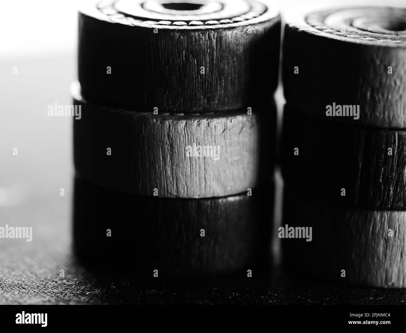 Checker Stack A grayscale shot of stacks of checkers pieces Stock Photo - Alamy
