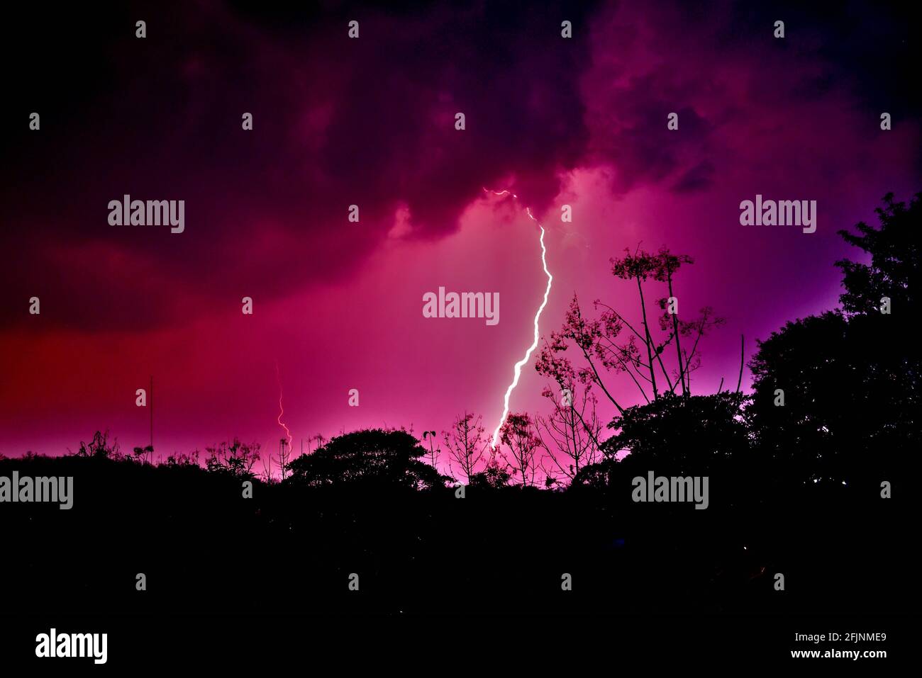 Lightning during a thunder storm in Thailand Stock Photo