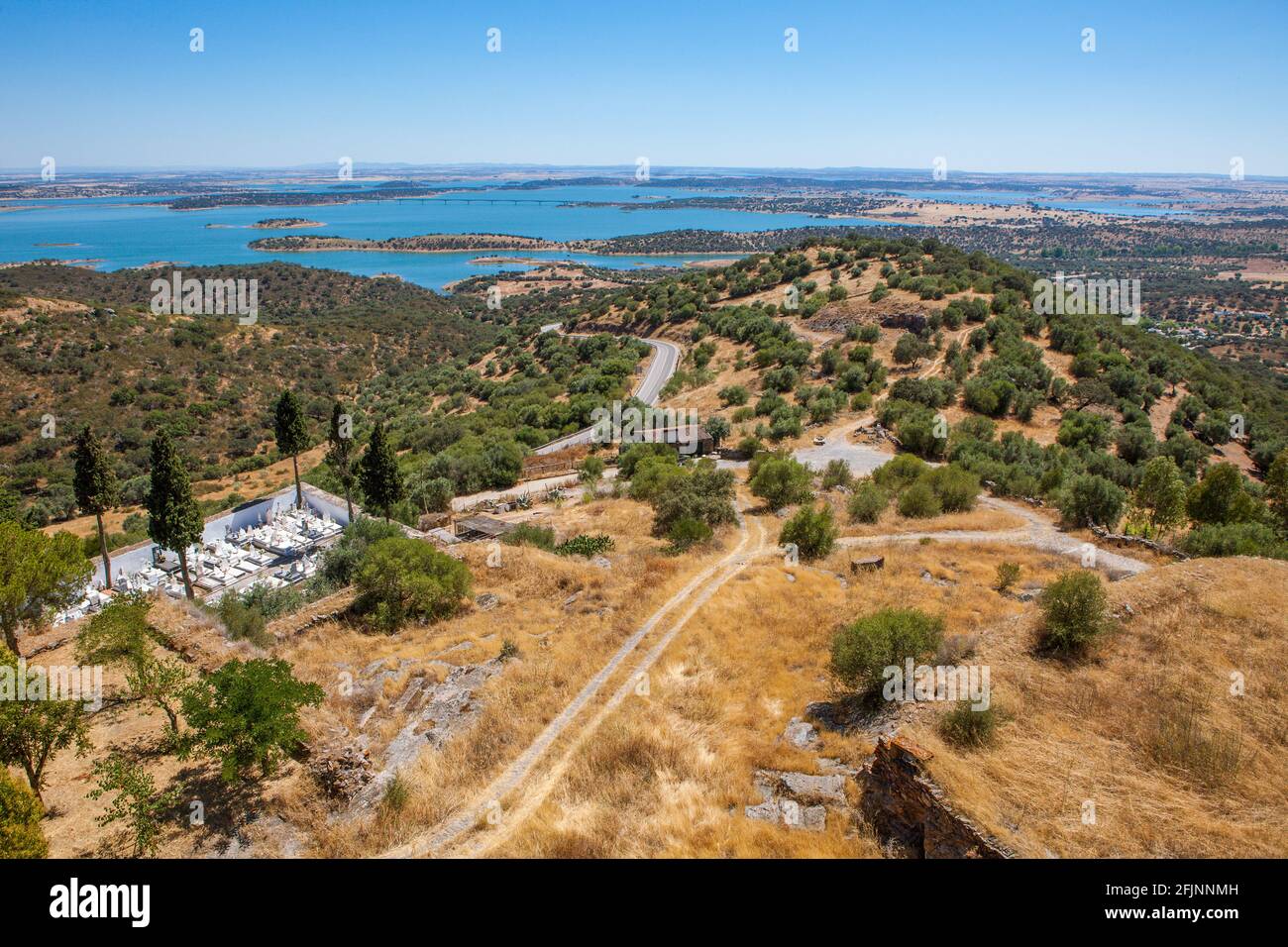 A view of the Alqueva Dam, the largest artificial lake in Europe, from the hilltop village of Monsaraz in the Alentejo region, Portugal Stock Photo