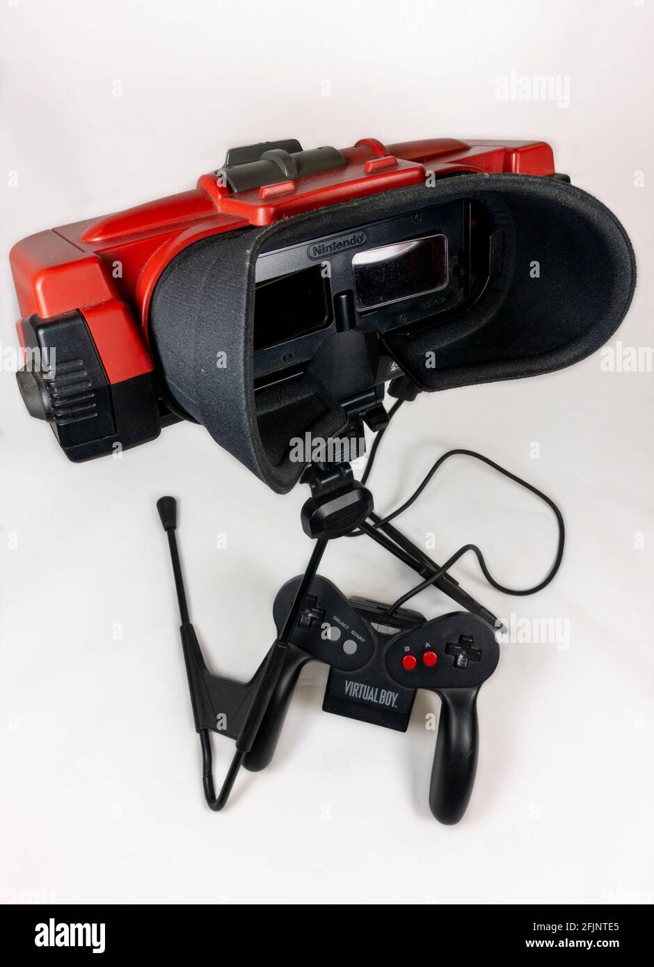 A Nintendo Virtual Boy table-top video game console with controller, first launched in Japan in 1995, (it did not launch in Europe). Stock Photo