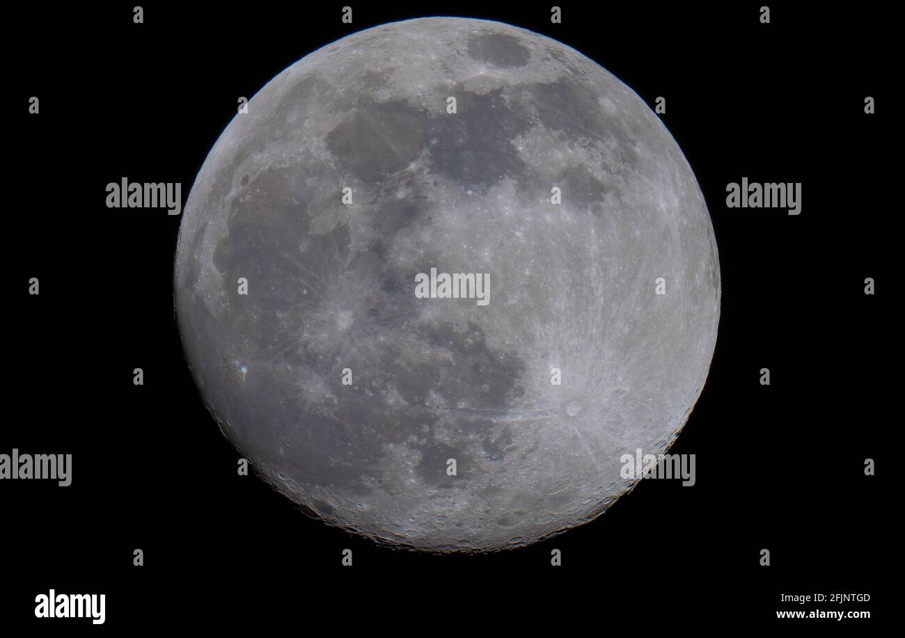 London, UK. 25 April 2021. 96% illuminated waxing gibbous Moon against black sky late evening in the constellation Virgo. The next full Moon from the UK is 4.31am on 27 April 2021, known as the Pink Moon. Credit: Malcolm Park/Alamy Live News. Stock Photo