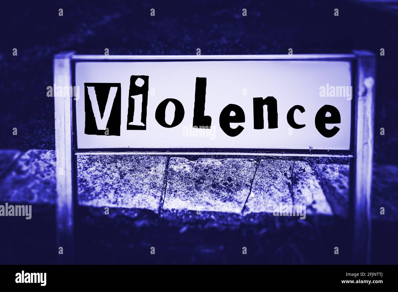 Violence displayed on Signage in blue tone Stock Photo