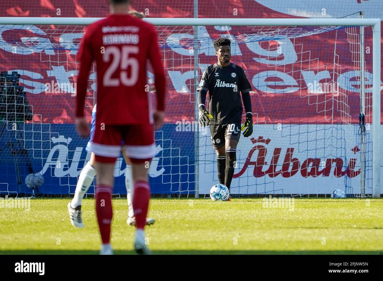 Odense, Denmark. 25th Apr, 2021. Goalkeeper Sayouba Mande (30) of OB seen during the 3F Superliga match between Odense Boldklub and Lyngby Boldklub at Nature Energy Park in Odense. (Photo Credit: Gonzales Photo/Alamy Live News Stock Photo