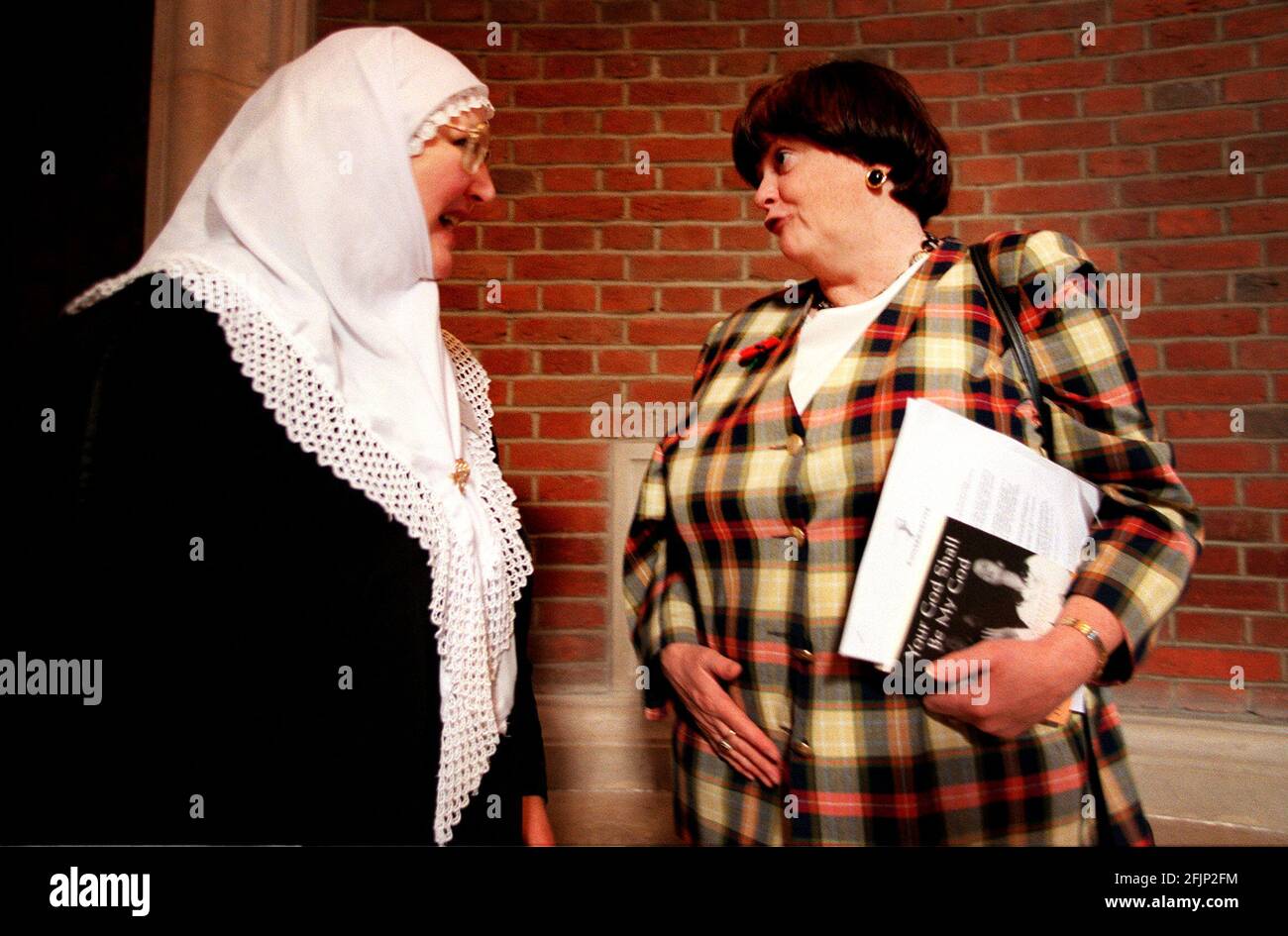 Ann Widdecombe shadow home secretary, Nov 2000who spoke at a consevative party policy forum with Britain's faith communities. Here speaking with Riqaiyyah Maqsood at the Emmanuelle center in Westminster. Stock Photo