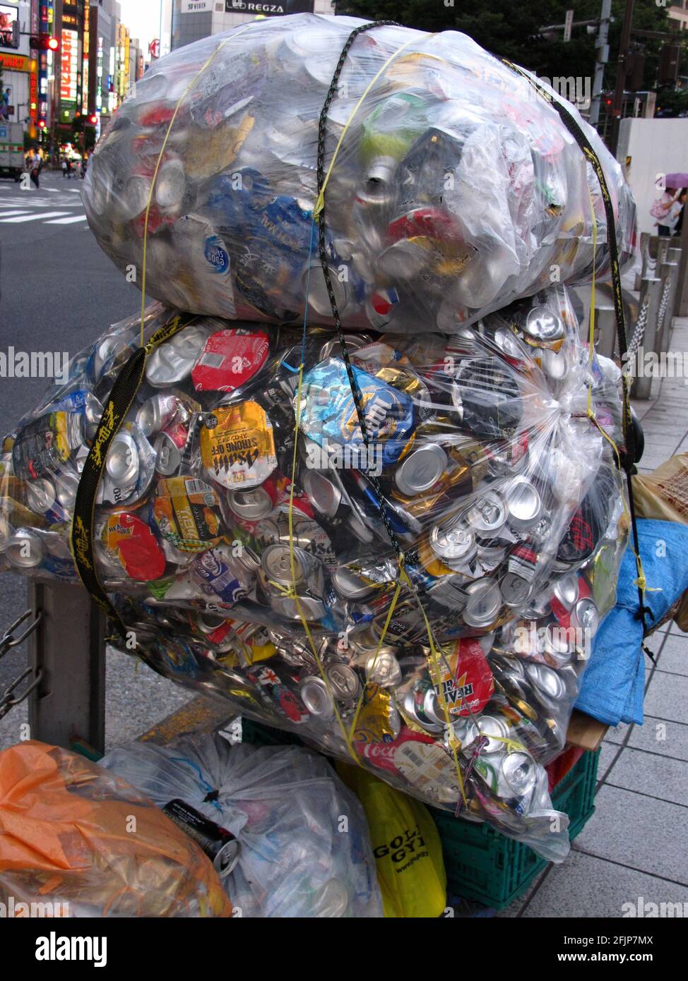 Garbage bags with beverage cans, can collection, recycling, Tokyo